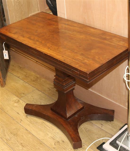 A Victorian mahogany folding tea table W.90cm